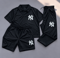 A three-piece black athletic loungewear set featuring a short-sleeve polo shirt, shorts, and pants, all with white New York Yankees 'NY' logos. The set is laid out flat on a gray background.