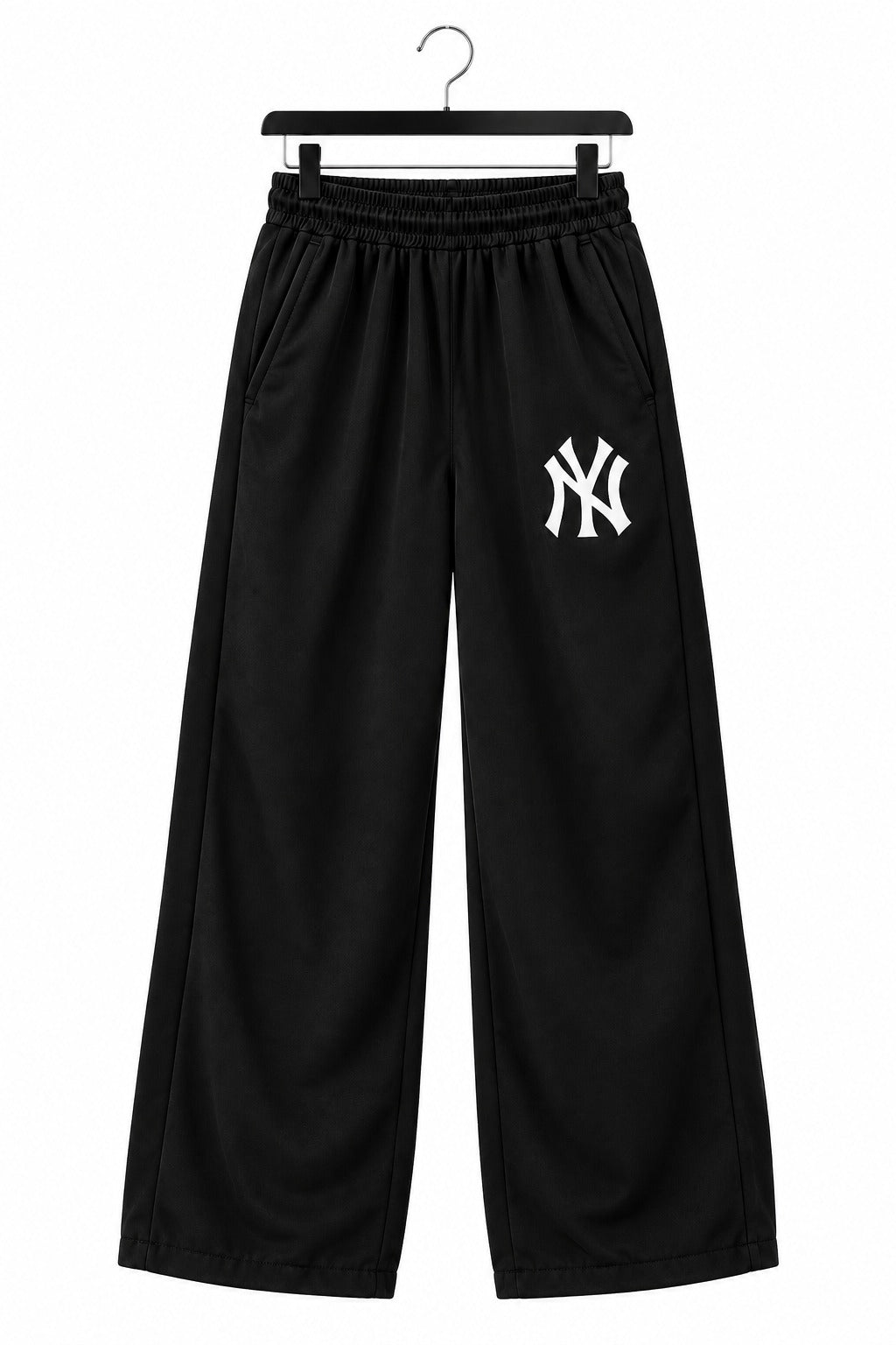 Black wide-leg sweatpants with an elastic waistband and a white New York Yankees logo on the left thigh, hanging on a black hanger against a white background.